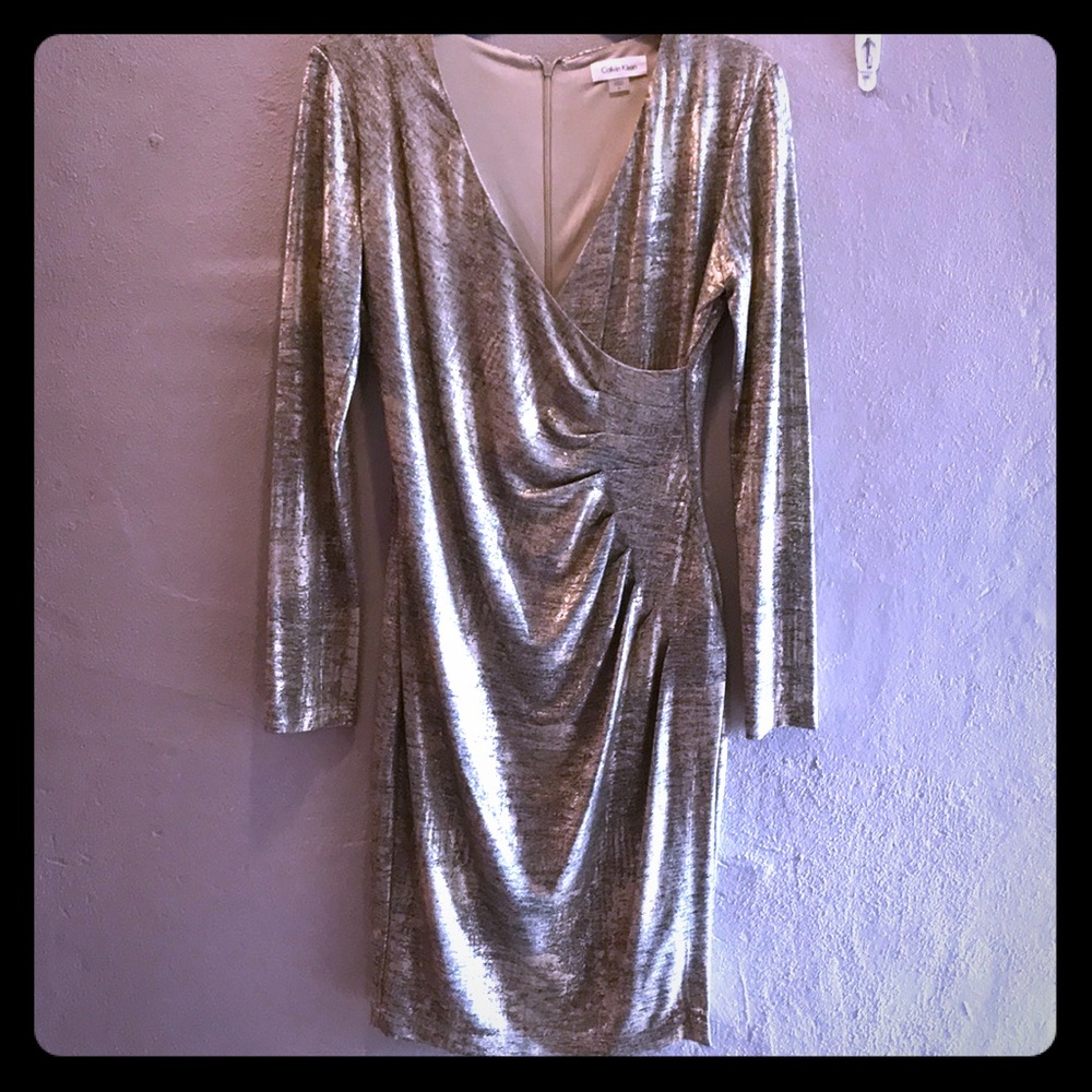 Calvin Klein longsleeve gold evening dress.